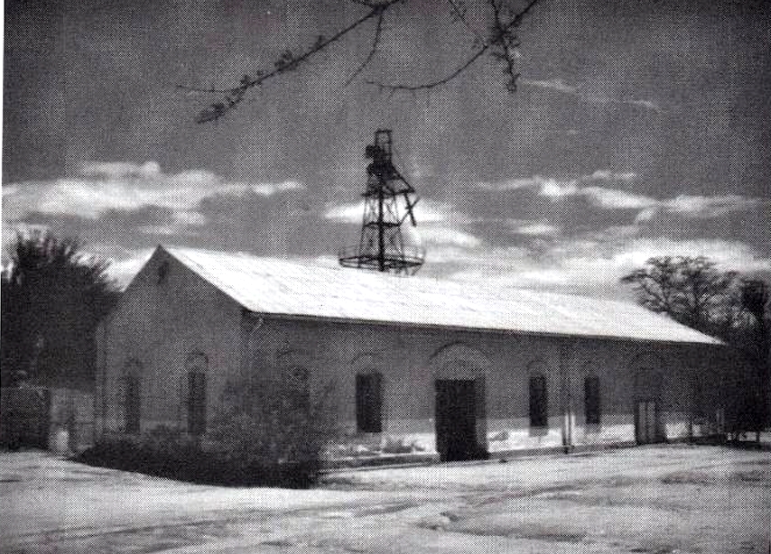 Die Hälbichsche Wagenschmiede mit Windmotor in Otjimbingwe